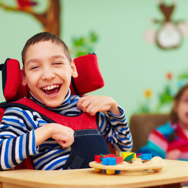 Cheerful boy disability rehabilitation center kids  600x600